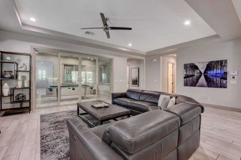 couch in modern living room for an Interior inspection of a tenant occupied rental home