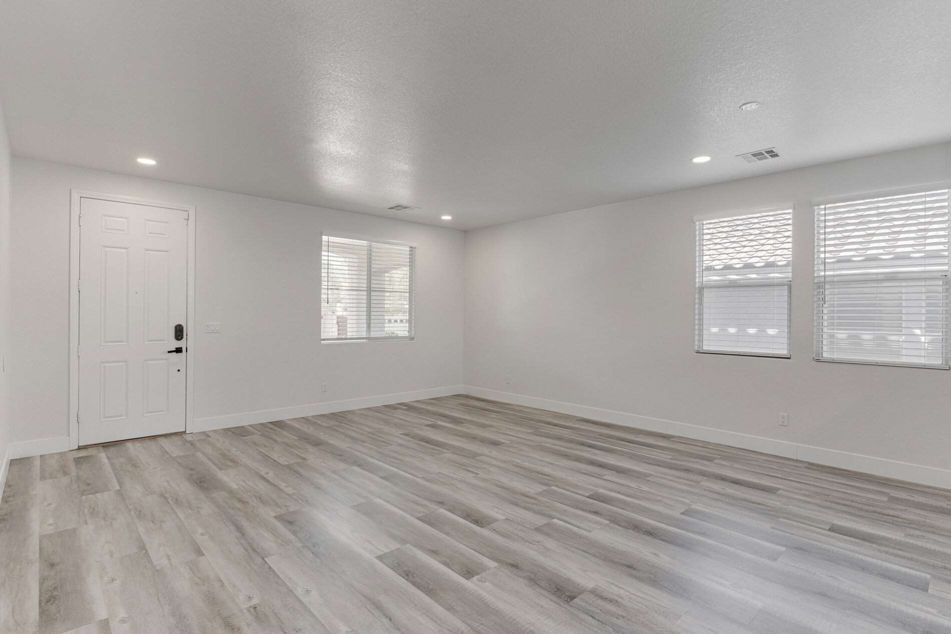 Unfurnished living room in a 2672 square foot Summerlin South 89135 rental managed by Rice Real Estate & Property Management